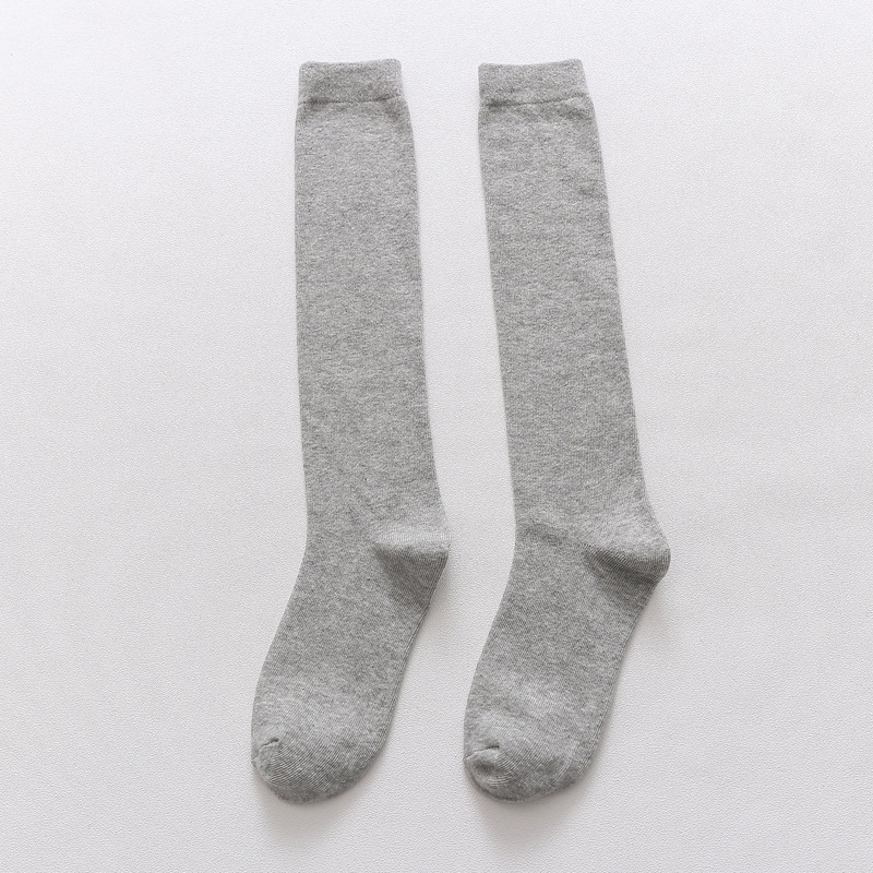 Calcetines largos para hombre, calcetines altos informales de color sólido para otoño e invierno, calcetines largos de algodón negros, calcetines transpirables que absorben el sudor