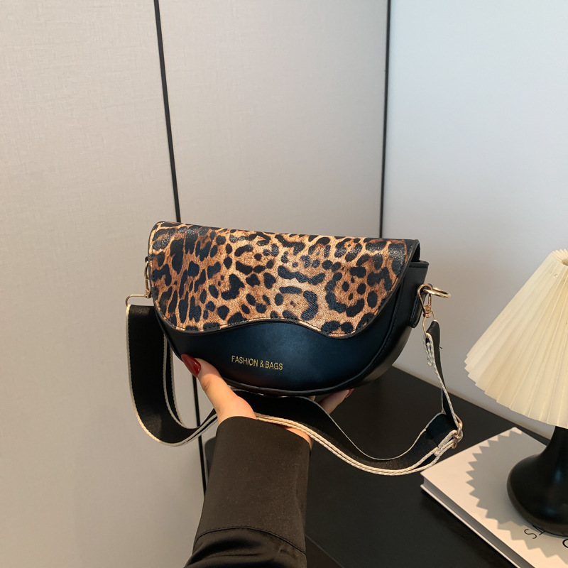 Simple and beautiful one shoulder underarm bag trend 2024 new wide shoulder strap saddle bag semi circular stylish messenger bag for women_voghion.com