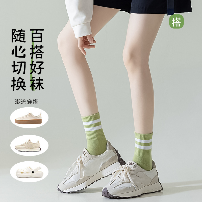 Primavera y verano de Zhuangyi niñas delgadas medias de algodón resistentes a las bolas de algodón universal rayas pantalones deportivas al por mayor