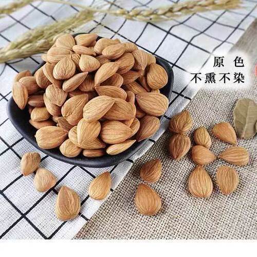 Wholesale Xinjiang almonds naturally dried original large almonds unsmoked original color sweet almond nuts snacks for pregnant women
