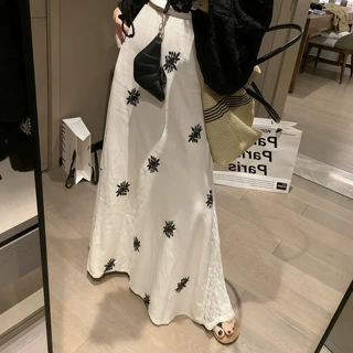 fanccy 亚麻刺绣蕾丝拼接半身裙女2026夏新款a字中长款设计感裙子