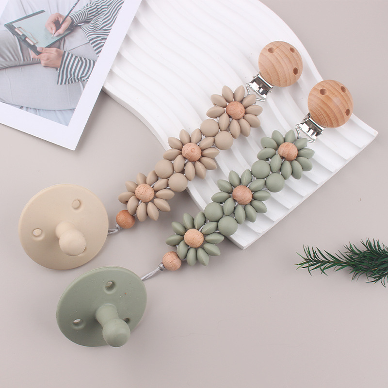 Nuevos productos para bebés, clip de chupete redondo de madera de haya, reconforta la cadena de chupete de silicona de girasol del bebé