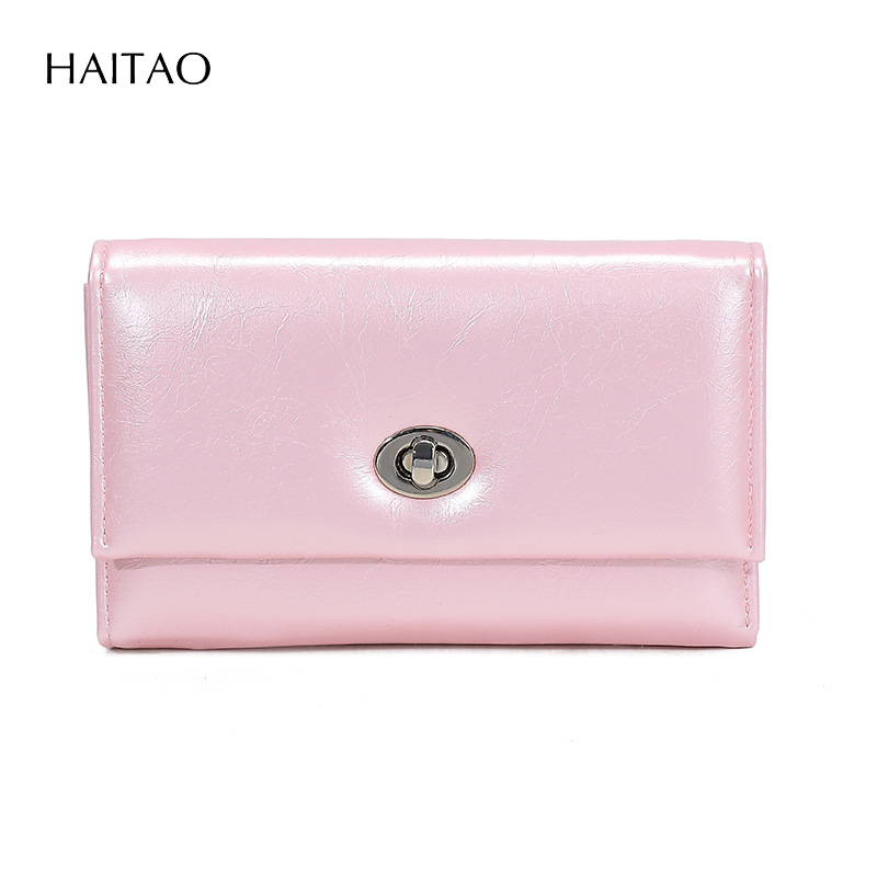 Nuevo tipo de billetera de mujer transfronteriza tres plegables cera de aceite billetera de cuero de gran capacidad multi-tarjeta de alta calidad billetera de cambio para mujeres