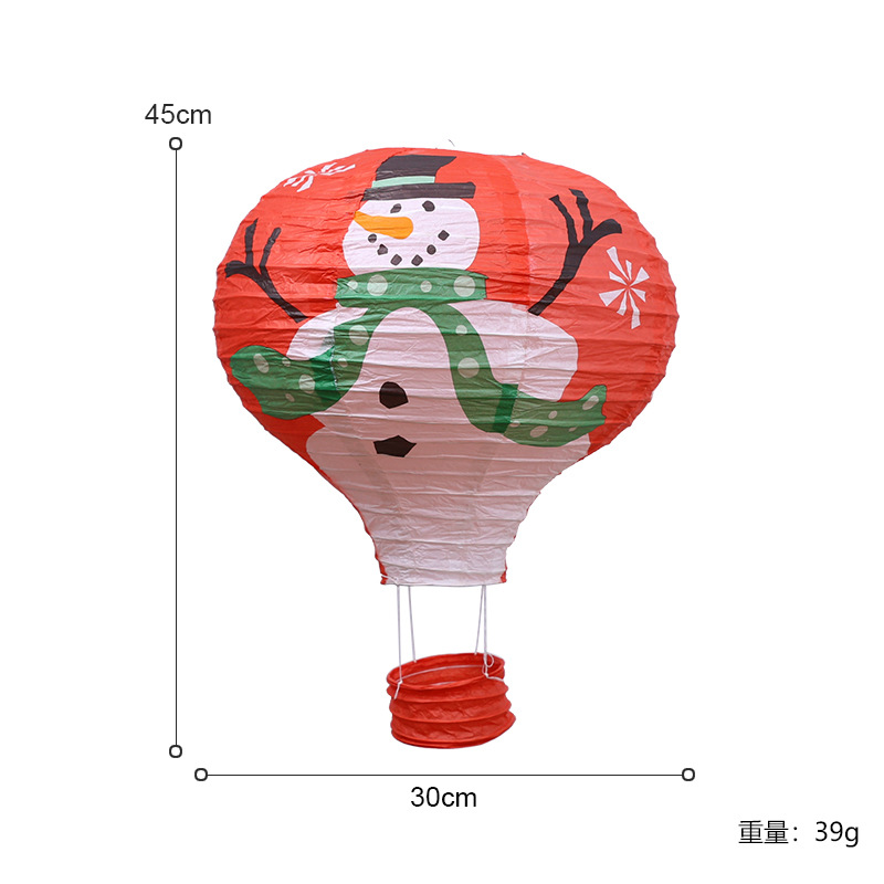 Pequeño globo aerostático-muñeco de nieve