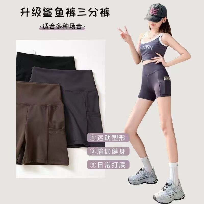 Nuevos pantalones de bolsillo de tiburón leggings para mujeres desnudas tres puntos de cintura alta pantalones de seguridad abdominales ajustados pantalones cortos de yoga adelgazantes