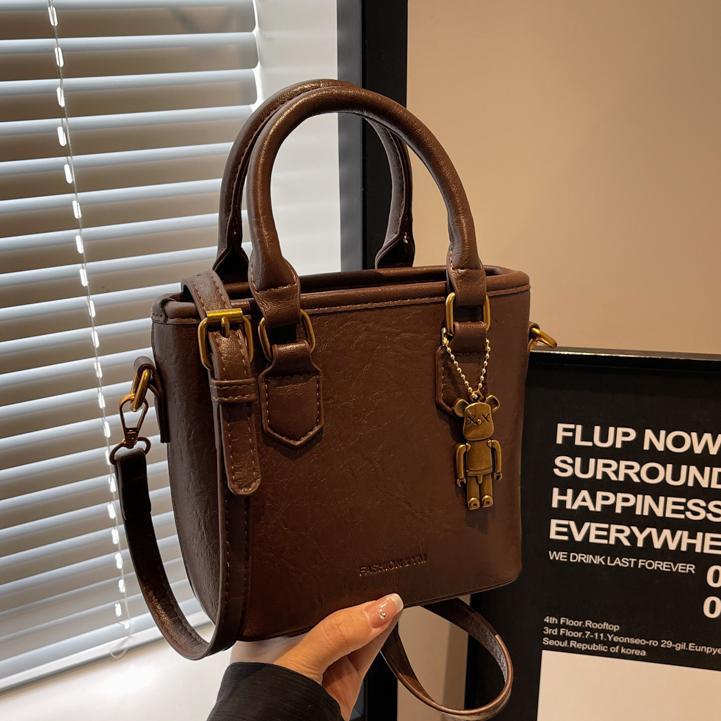 Bolso de mano para mujeres 2026 nuevo diseño de nicho universal bolso de cubo de alta sensación de explosión popular bolso de hombro