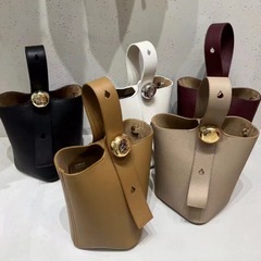 スター同モデルの新型羅家高定バケツバッグ本革女性バッグ前肩ベルト調節ボタン付きバッグシングル肩斜め掛け