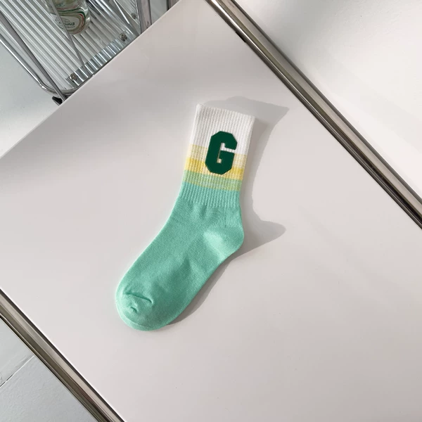 White, yellow, green gradient G