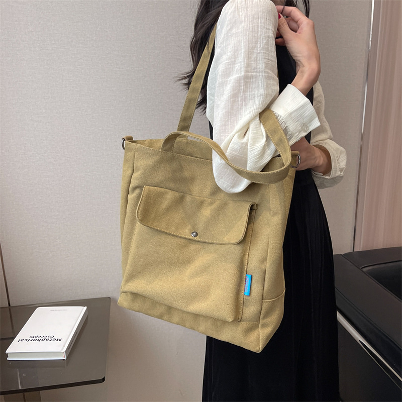Los fabricantes venden al por mayor el nuevo bolso Tote para mujer bolso de lona de color sólido de gran capacidad bolso de mensajero de hombro casual de moda simple
