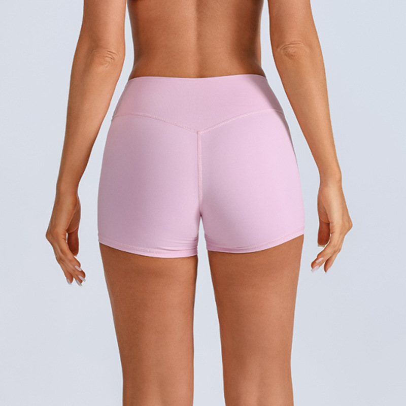 Traje de yoga europeo y americano transfronterizo, espalda hermosa con almohadilla para el pecho, sujetador con tirantes cruzados, pantalones deportivos de secado rápido de melocotón de cintura alta