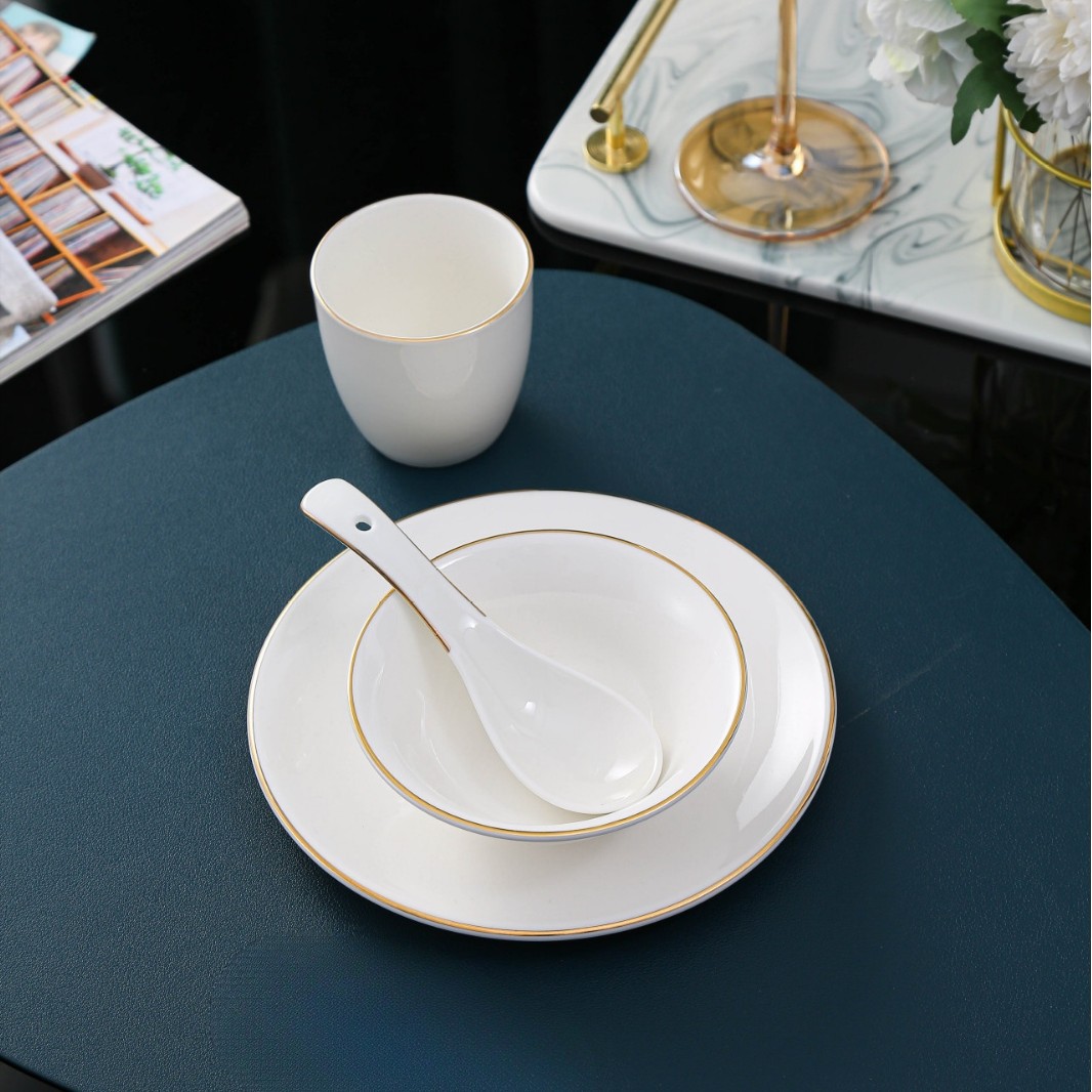 Gold-rimmed fin bowl set of four