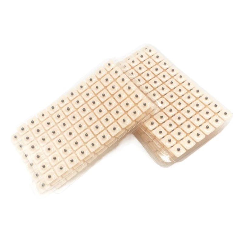 Новая дата 600 ушных акупунктурных точек. Давление семян. Ушная наклейка. Ушная наклейка.