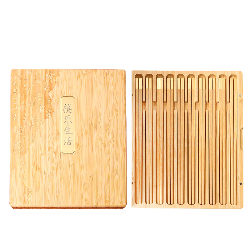 Palillos de madera de ala de pollo hogar de madera maciza Ébano cabeza de cobre niebla palillos dorados regalo de negocios en caja de bambú logotipo personalizado