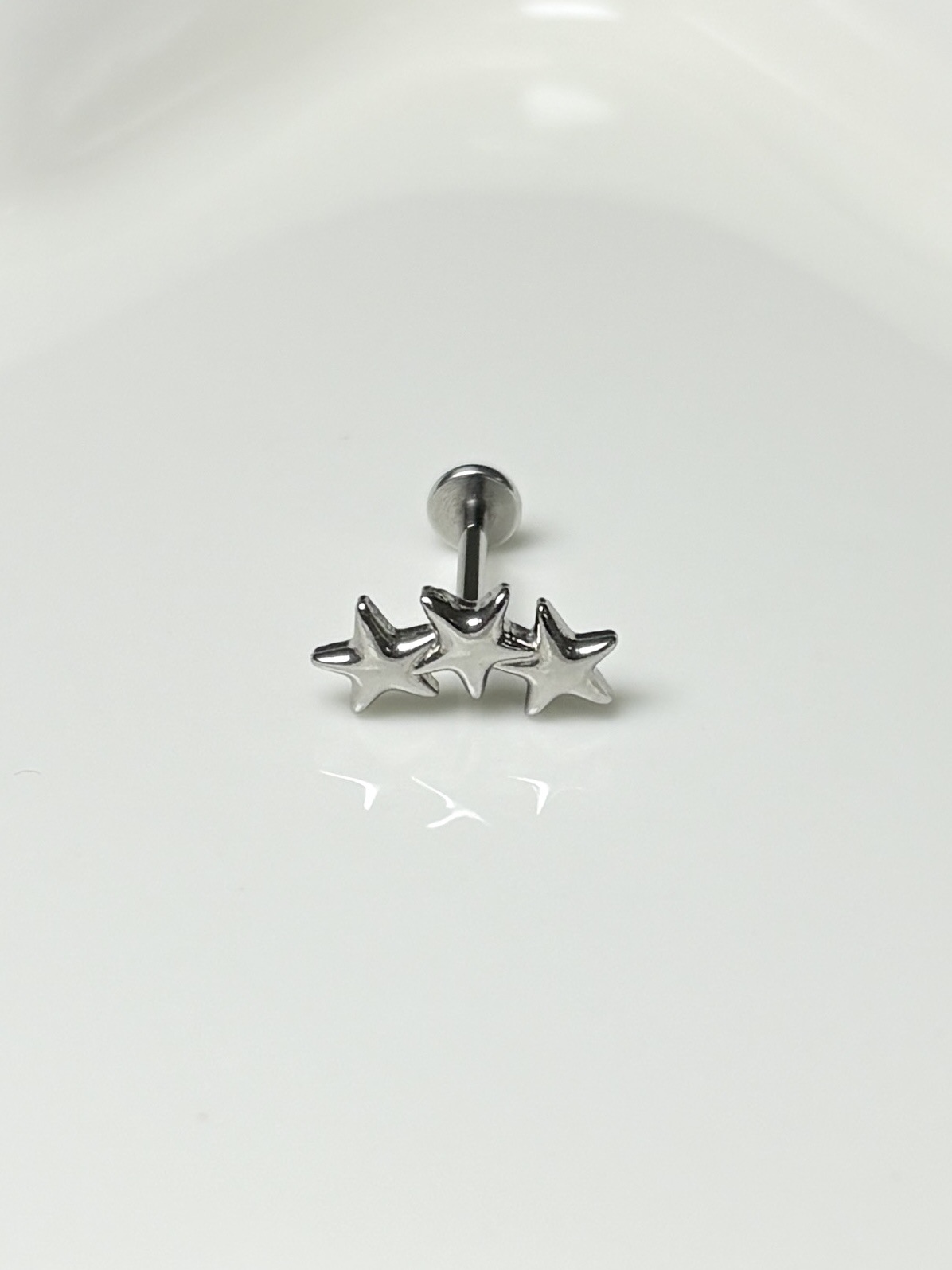 Pointed labret stud close-up product detail