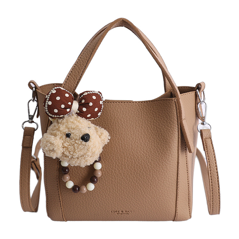 Nicho coreano litchi pattern bolso de cubo de mano mujer comercio exterior nueva moda alta textura ligera lujosa bolsa de mochila