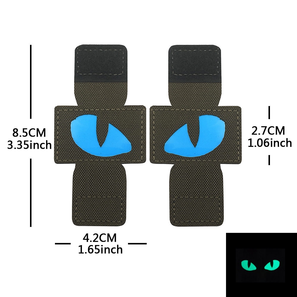 Creativo suministro personalizado gato ojo luminoso moral sello al aire libre militar fan mochila sello pequeño diablo militar MOLLE colgante