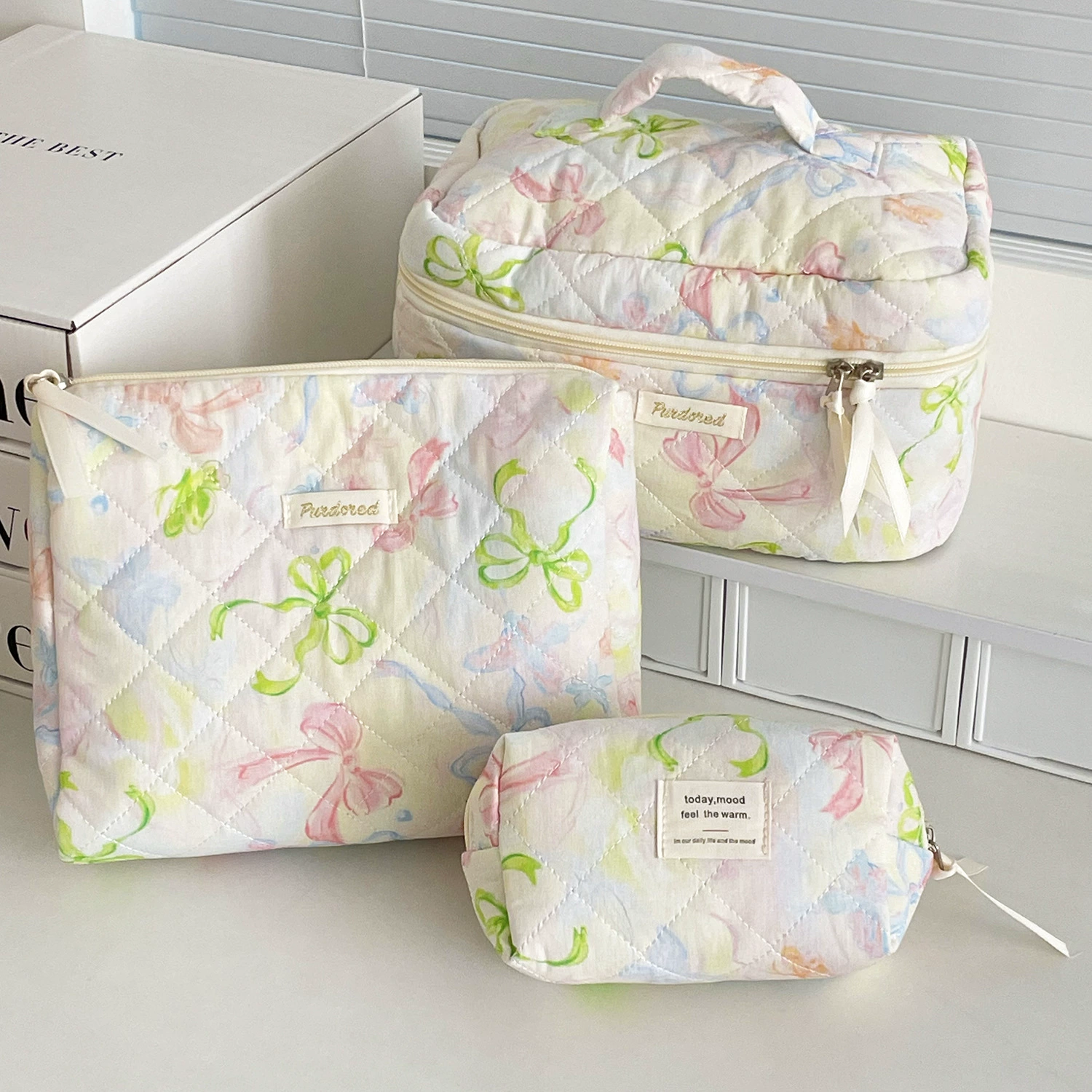 Capacious cosmetic bag with bow, handheld soft organizer bag, flowered