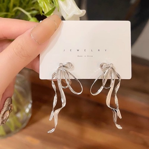 Japanese and Korean ins temperament irregular bow earrings fairy sweet cool metal earrings S925 silver needle earrings wholesale