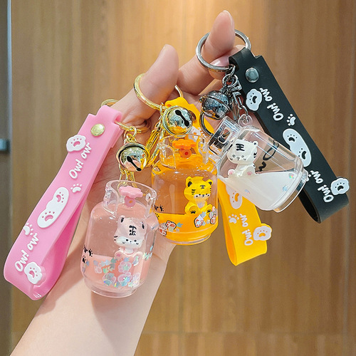 Creative floating doll oiled tiger key chain acrylic quicksand bottle key chain exquisite car pendant wholesale