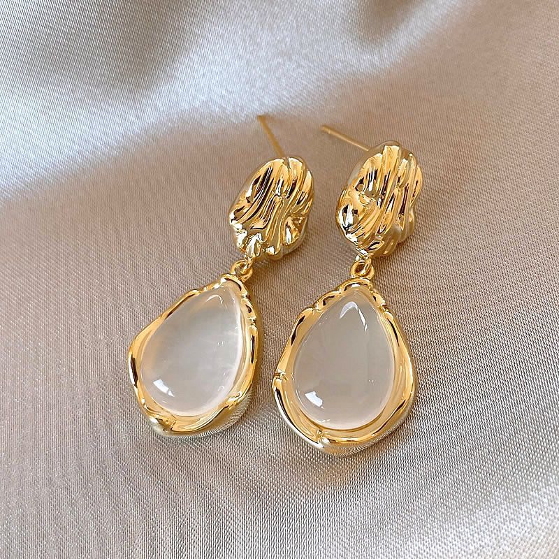 Fashionable elegant earrings drop-shaped
