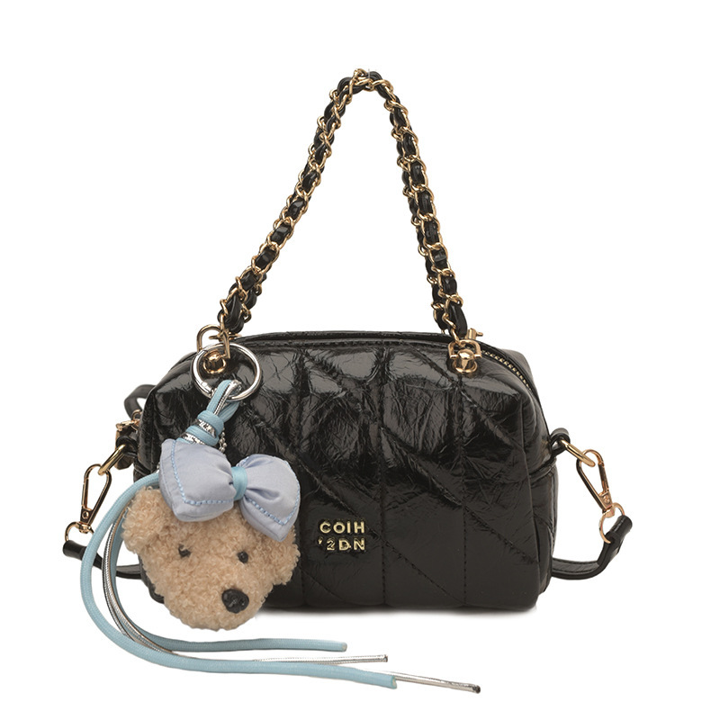 Bolsa de estilo de viaje de cadena de diamante para mujeres 2026 nueva sensación diaria de estilo extranjero bolso de hombro otro medio