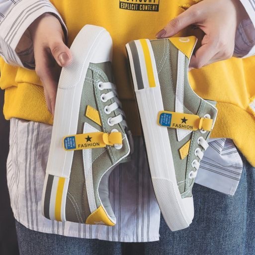 Zapatos blancos de primavera y otoño para mujeres zapatos de lona de altura baja primavera 2026 nuevos estudiantes coreanos zapatos de goma transfronterizos transfronterizos