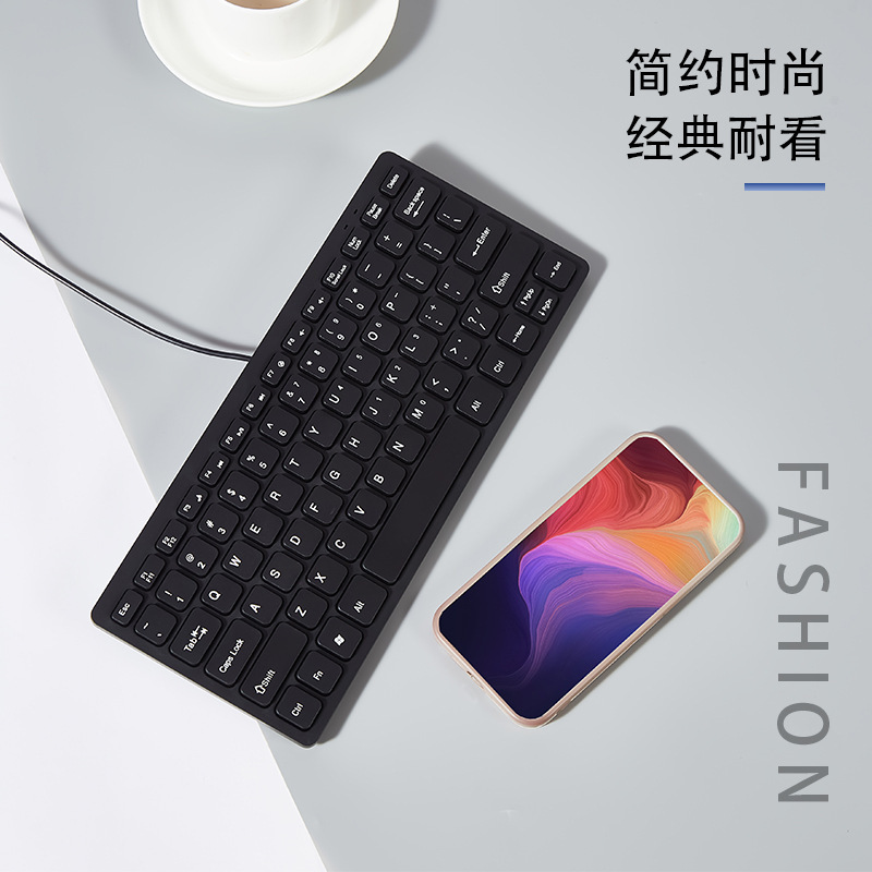 K1000 Chocolate 78-Key Mini Wired Keyboard Multimedia Thin and Light Portable Laptop USB External