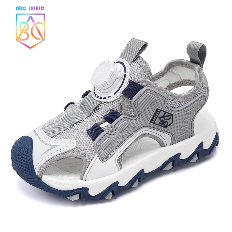 Niños 2025 verano nuevo estilo impermeable y ligero para niños medianos y grandes boca giratoria sandalias deportivas al aire libre sandalias para niñas