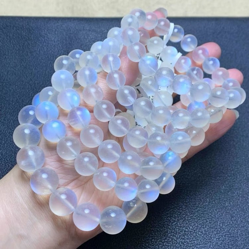 天然氷種クリーム体の青い月の光のブレスレットの女性の虹の光の月の光の強い青い水晶の手は女性を送ります。|undefined