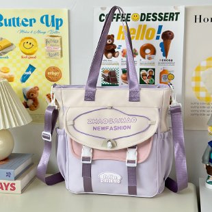 Nueva mochila escolar de nailon de gran capacidad, moderna y bonita, para estudiantes de primaria, bandolera portátil, venta al por mayor 2026 image 6