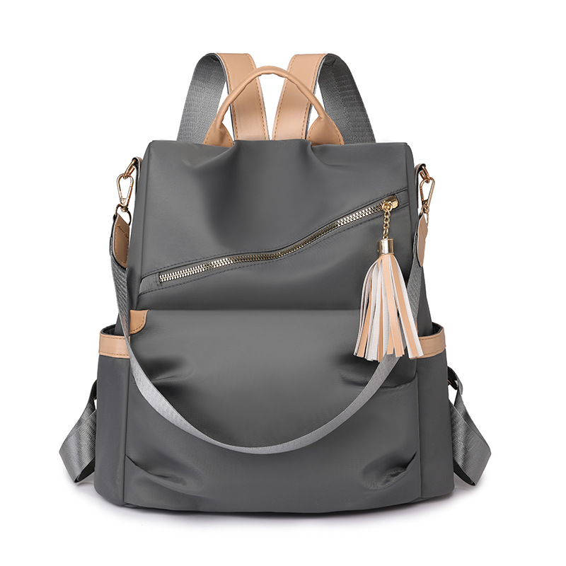 Spot al por mayor 2025 nueva mochila antirrobo casual para mujer moda borla mochila para mujer de gran capacidad marea