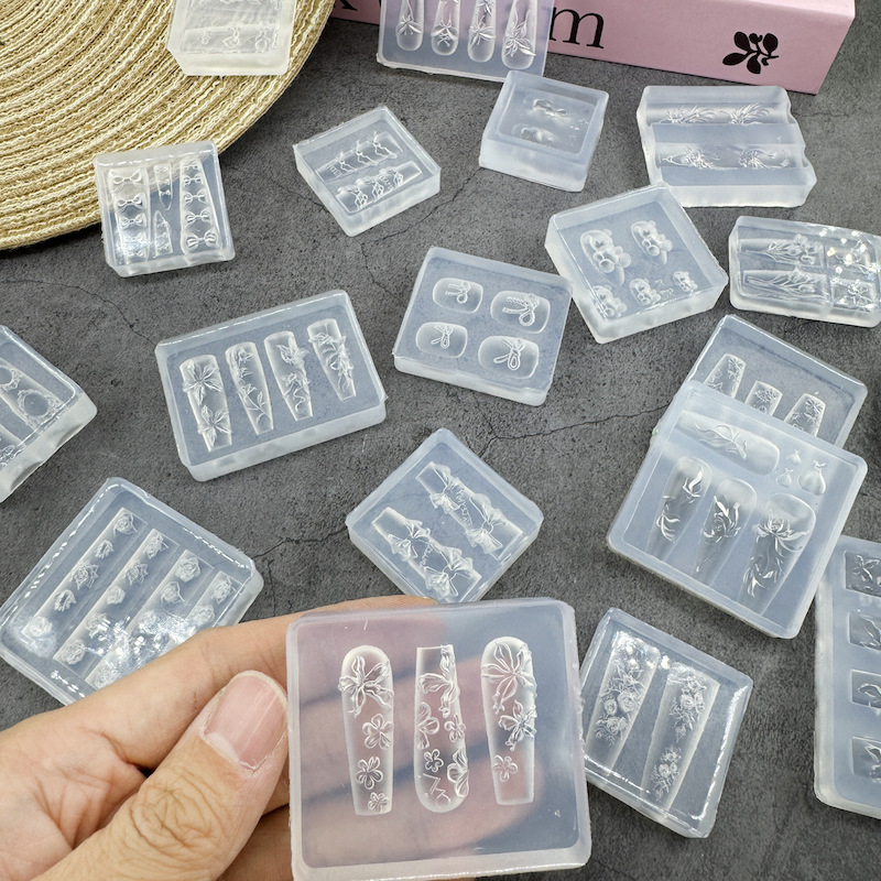氷感の高い爪の金型のチューリップの漫画の蝶結びのシリコンの膜は爪のツールセットの工場の卸売りを備えます。|undefined