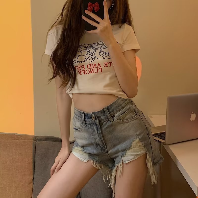 黒灰色の高腰の穴が開いているデニムの半ズボンの女性の夏の新型はゆったりしていて痩せています。|undefined