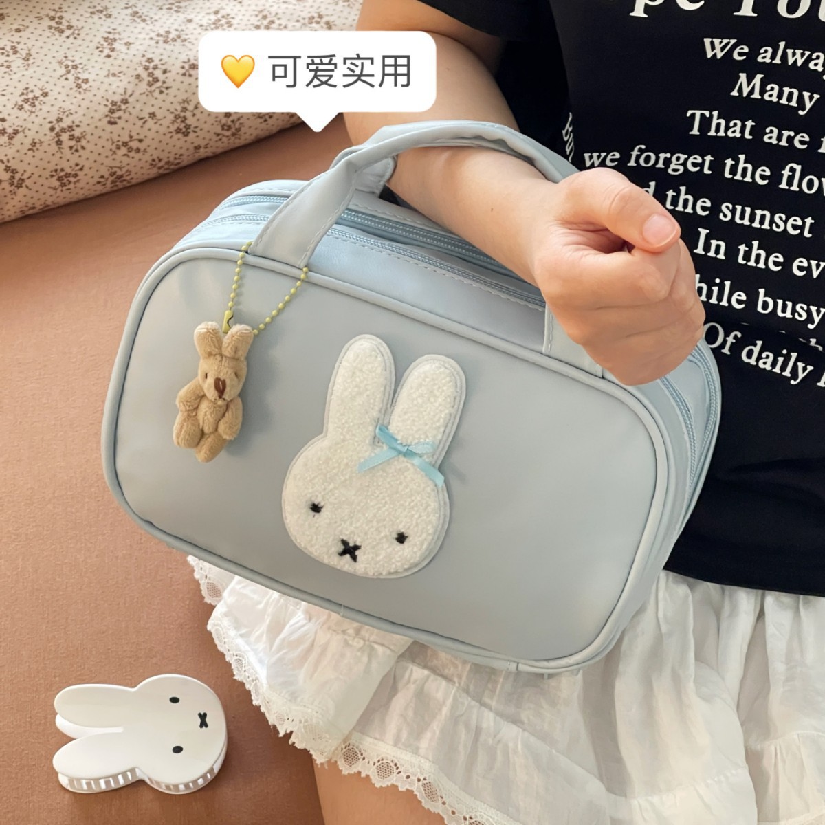 Bolsa de maquillaje de gran capacidad portátil femenina bolsa de almacenamiento de salida 2025 nuevo cosmético cepillo de maquillaje partición bolsa de lavado