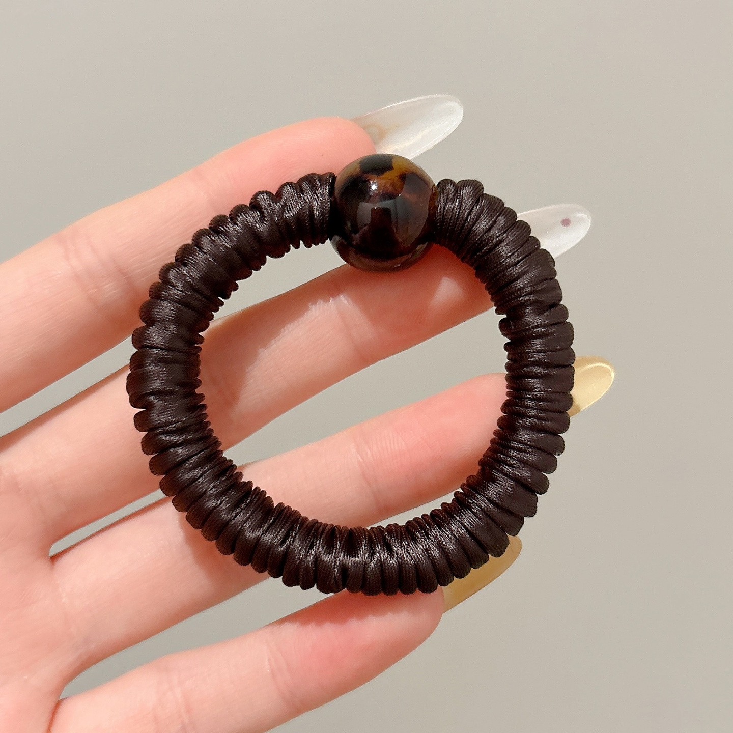 Coletero elástico sencillo de nuevo estilo 2026, banda para el pelo pequeña sin costuras para mujer, suave para el cabello, sujetador de cola de caballo.