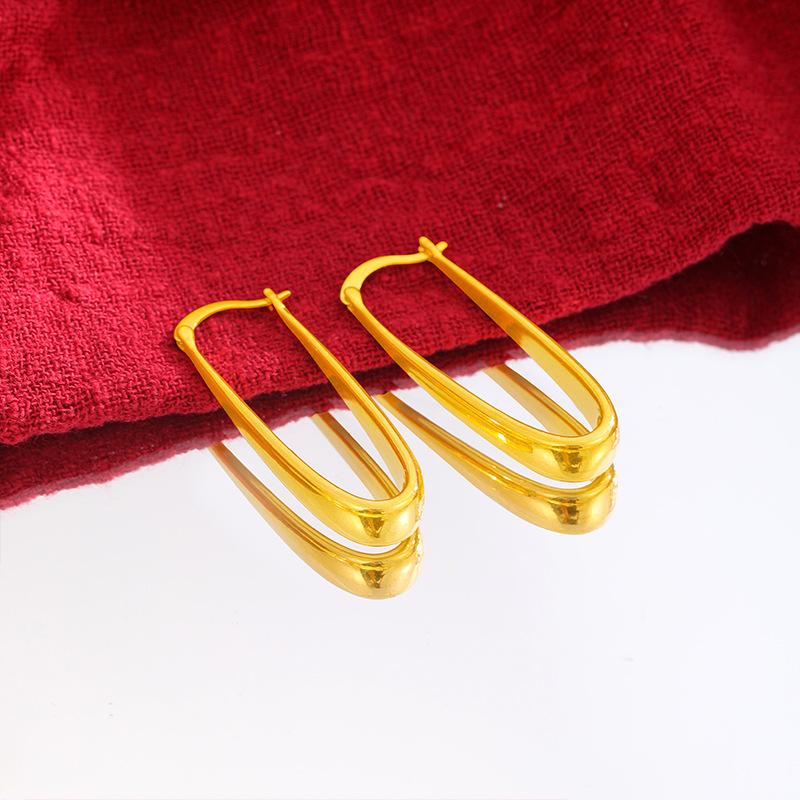 En FORMA DE U gota de agua diseño pendientes de las mujeres pendientes de oro imitación simple todo partido geométrico aleación de cobre moda elegante al por mayor