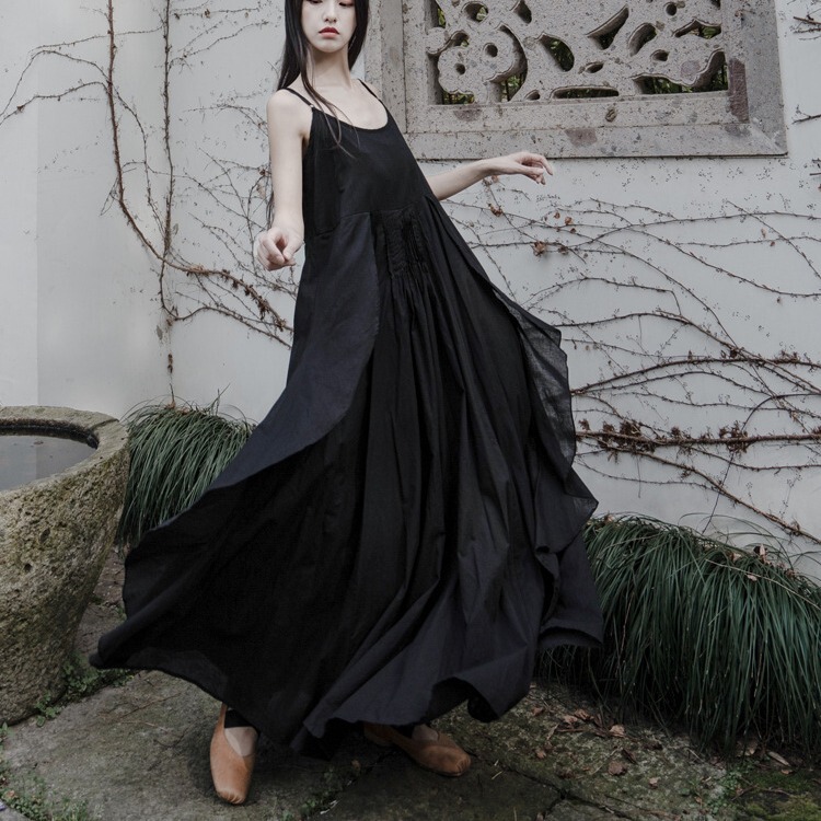 Elegant Ruffled Pleated Artistic Flowing Strap Dress in Black and White, Perfect for Vacation and Beach Wear Elegant Ruffled Pleated Artistic Flowing Strap Dress in Black and White, Perfect for Vacation and Beach Wear