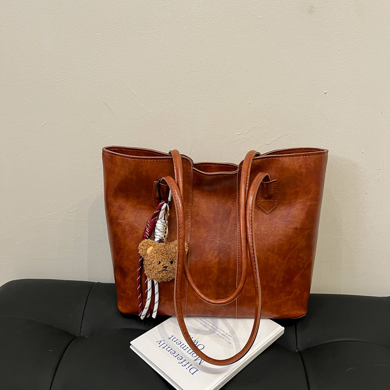 Bolso de gran capacidad de viajero de temperamento de alta gama para mujer 2024 nuevo otoño e invierno bolso de hombro de lujo ligero bolso de ocio