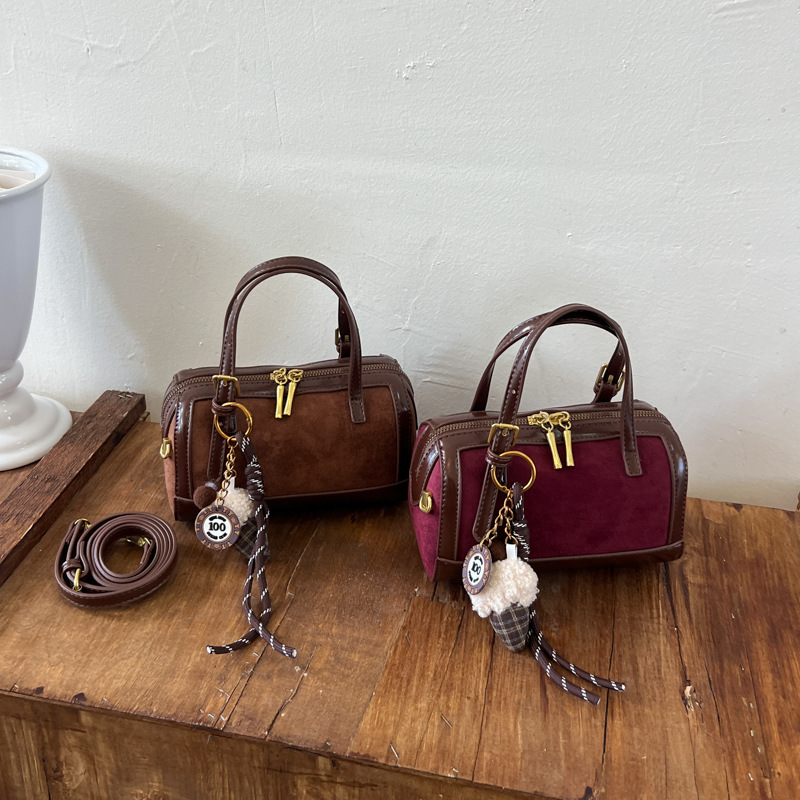 Women's suede bag 2026 new autumn vintage Boston handbag, high-end shoulder and crossbody commuter bag Women's suede bag 2026 new autumn vintage Boston handbag, high-end shoulder and crossbody commuter bag