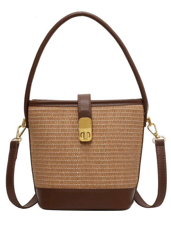 Bolso de nicho coreano bolso de cubo de tejido de mano para mujeres verano 2026 nuevo color de contraste de textura alta bolsa de mochila