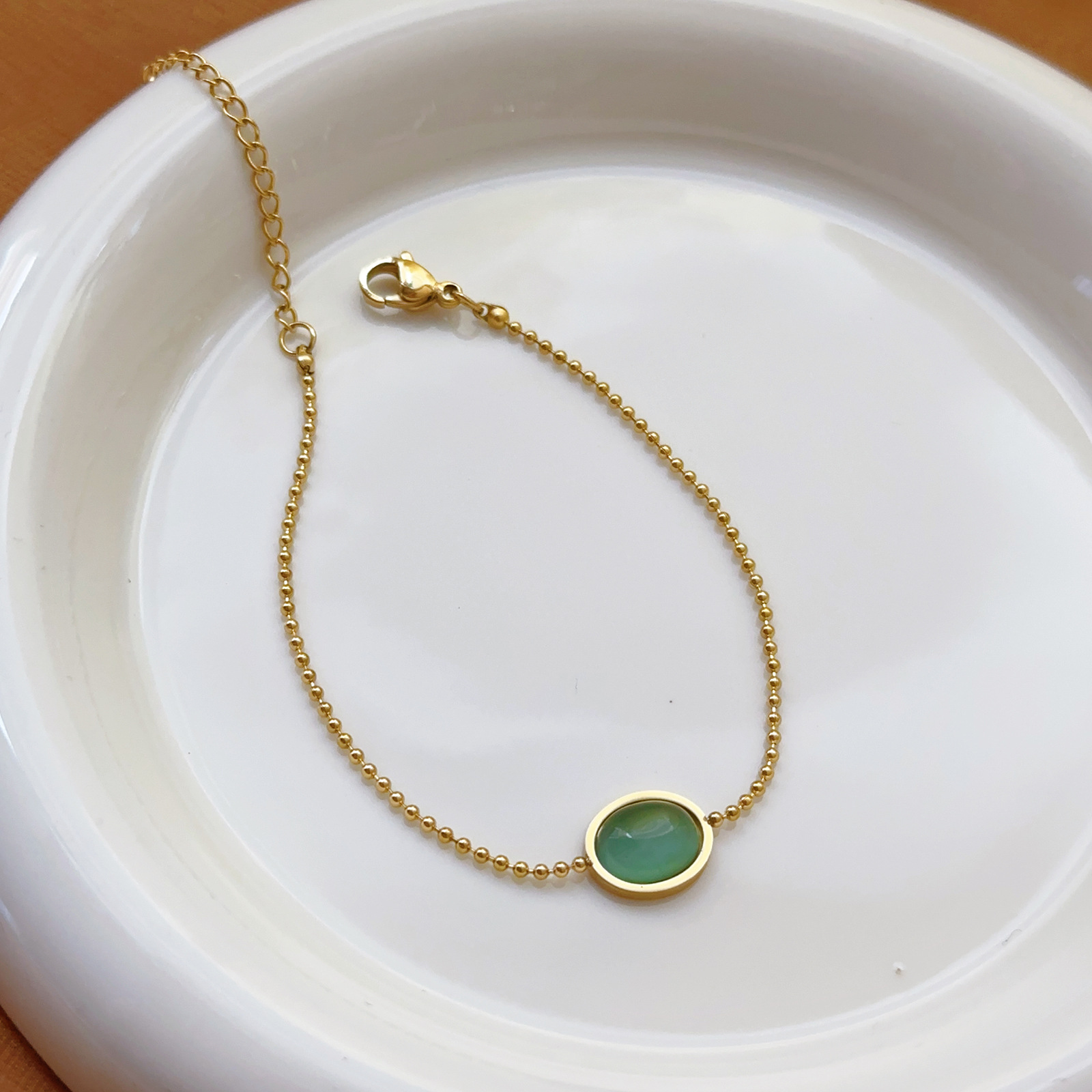 Nueva pulsera de acero de titanio simple sin decoloración, niña, sentido de alta gama, gota de agua, moda de verano, corazón de amor de lujo ligero, tobillera, todo fósforo