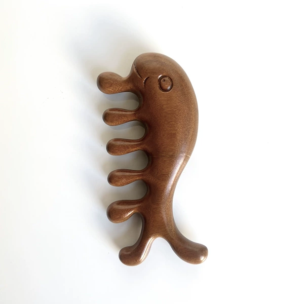 Golden sandalwood whale massage comb