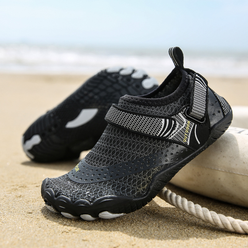 Nuevos zapatos de playa para niños al aire libre transfronterizos, zapatos de vadeo de cinco dedos, zapatos de buceo, zapatos de natación antideslizantes gruesos