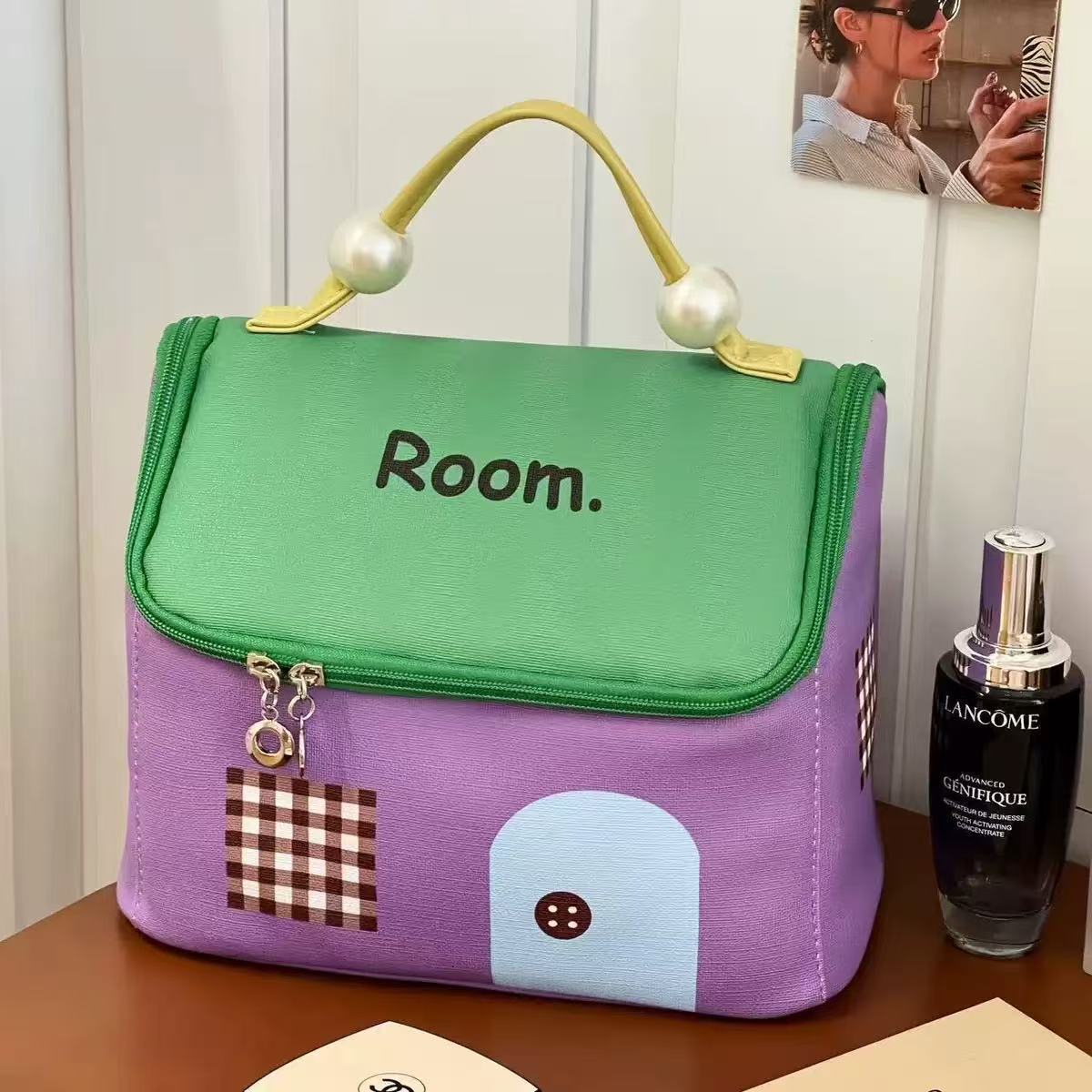 Nueva bolsa de cosméticos de dopamina de celebridades de Internet de gran capacidad y alto valor Bolsa de almacenamiento portátil impermeable PU