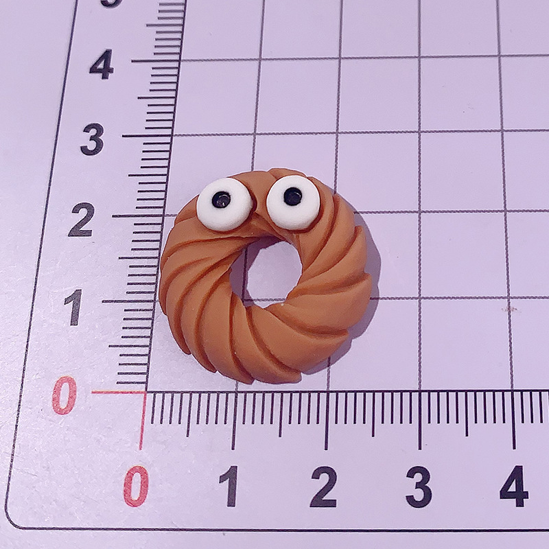 Caricatura extraña emoji galletas accesorios de resina DIY pegamento crema caja de teléfono móvil botón de zapato joyería parches galletas de carbón