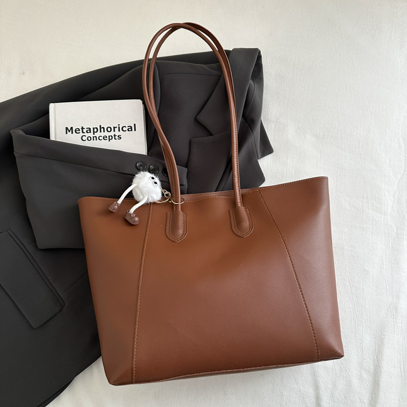 Bolsa de mano de textura de viaje casual otoño / invierno 2024 nuevo estilo coreano simple bolso de hombro axilar temperamento bolso especial