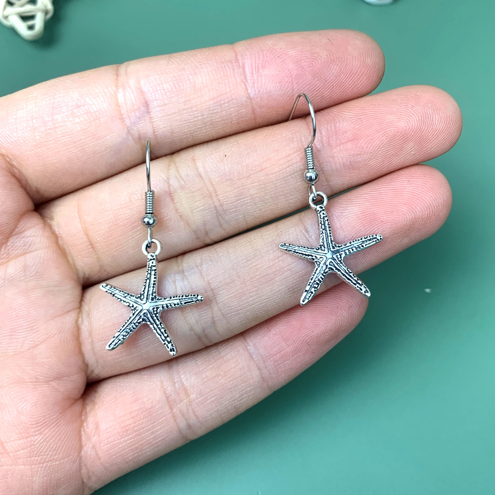 1 Pair Retro Sun Moon Metal Women's Drop Earrings display picture 1