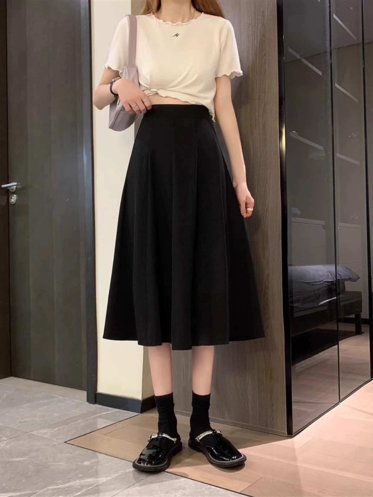 Fitted black long skirt, plus size, high waist, A-line, for pear shaped body, hip-accented