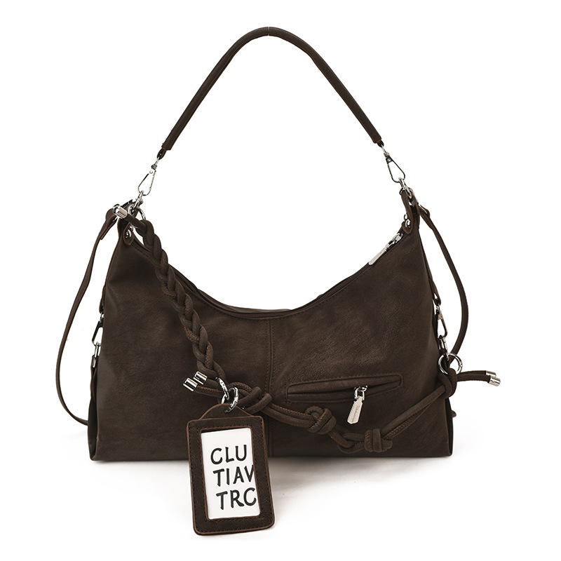 Bolsa de viaje transfronteriza de gran capacidad para mujeres 2025 nuevo estilo coreano de hombro casual bolso de brazo de alto nivel sensación de mochila