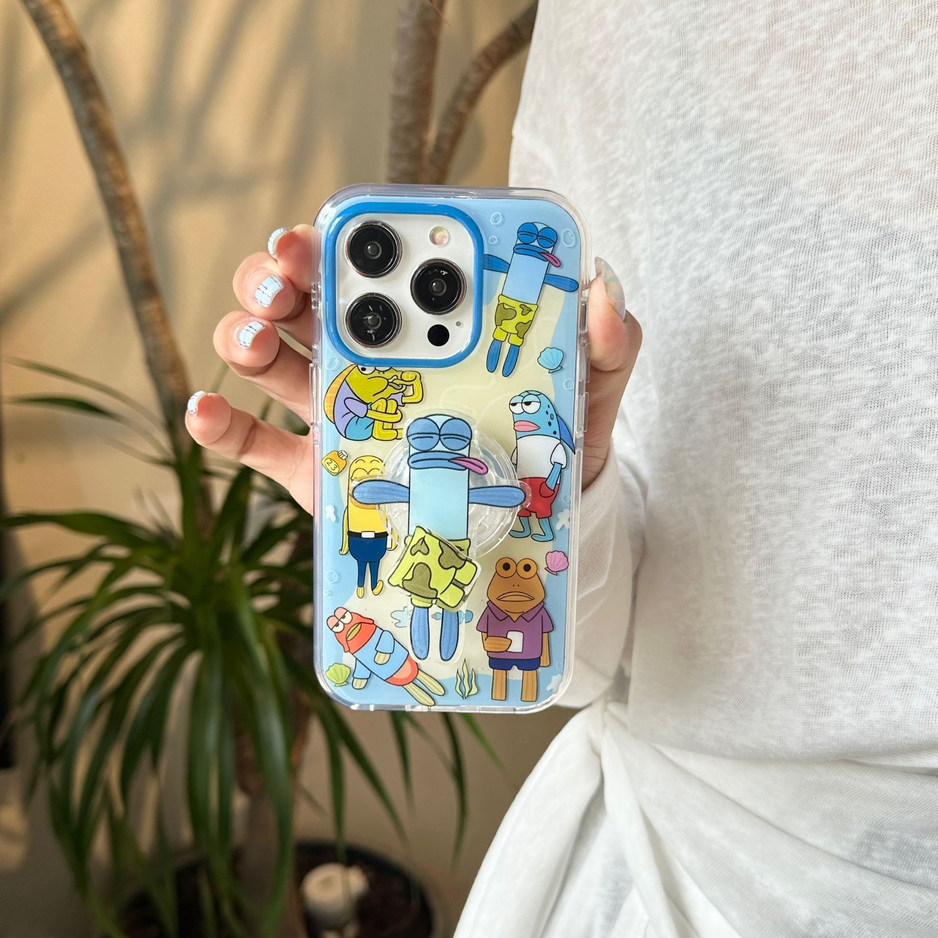 Divertido pez feo de dibujos animados para 16ProMax Apple 14 funda para teléfono móvil iphone15PM soporte giratorio 16 femenino 13